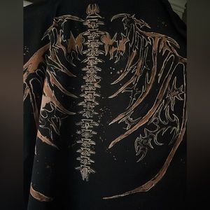 hand drawn Bleach vertebrae with skeleton wings